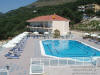 link to hotels, hotel  98 in parga,photo with the pool and the main building of hotel 