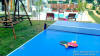Ο κήπος του Λουξ καταλύματος με table tennis με τις Βίλλες και τις ατομικές Πισίνες