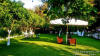 The gardens of the Family residence with swimming pool in Valtos area-Prga