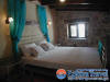 Traditional,Stone house in Parga in Greece,with High quality.The bedroom of HALASMA maisonete apartment.