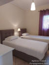 The seperate renovated bedroom with 2 single beds of the Villa