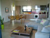 Luxurious kitchen/living room with dining table of Portokali apartment