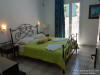 The bedroom (with double bed) of the large family apartment with 2 bedrooms with swimming pool 