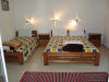 The Bungalow with a double and a single bed for 3 persons